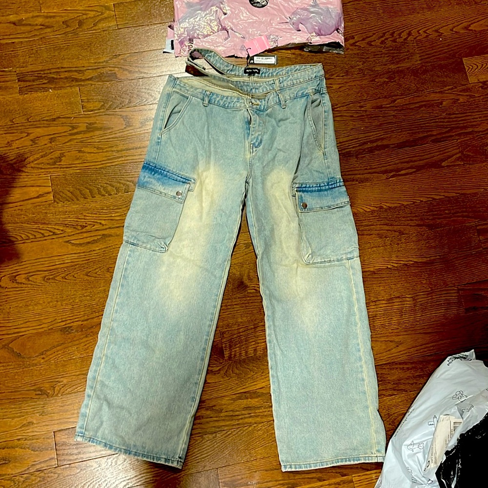 Ice blue  washed cut out waistband pocket detail jeans size 10 New,